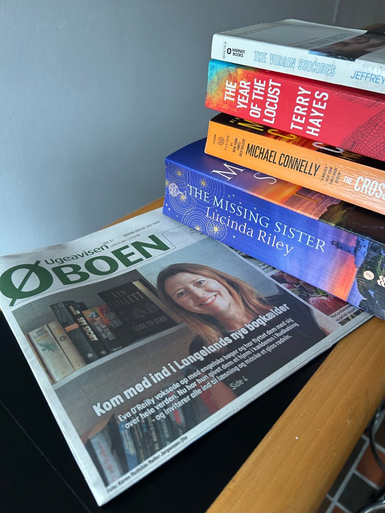 Front page of the local newspaper featuring The Story Cellar and four book on top of each other